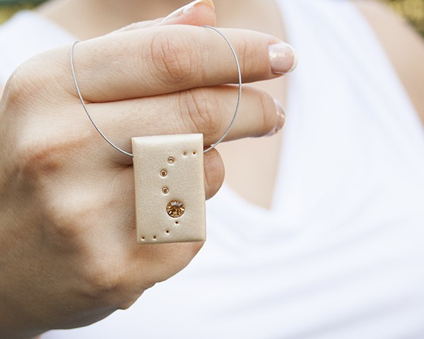 Modern minimalist necklace: beige rectangle with golden topaz rhinestones