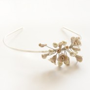 Floral asymmetrical tiara with ivory rosebuds and pearls