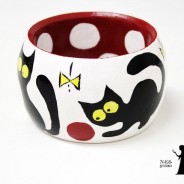 Wooden bangle with four black cats and polka dots
